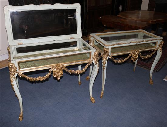 A pair of painted and parcel gilt bijouterie tables, W.92cm